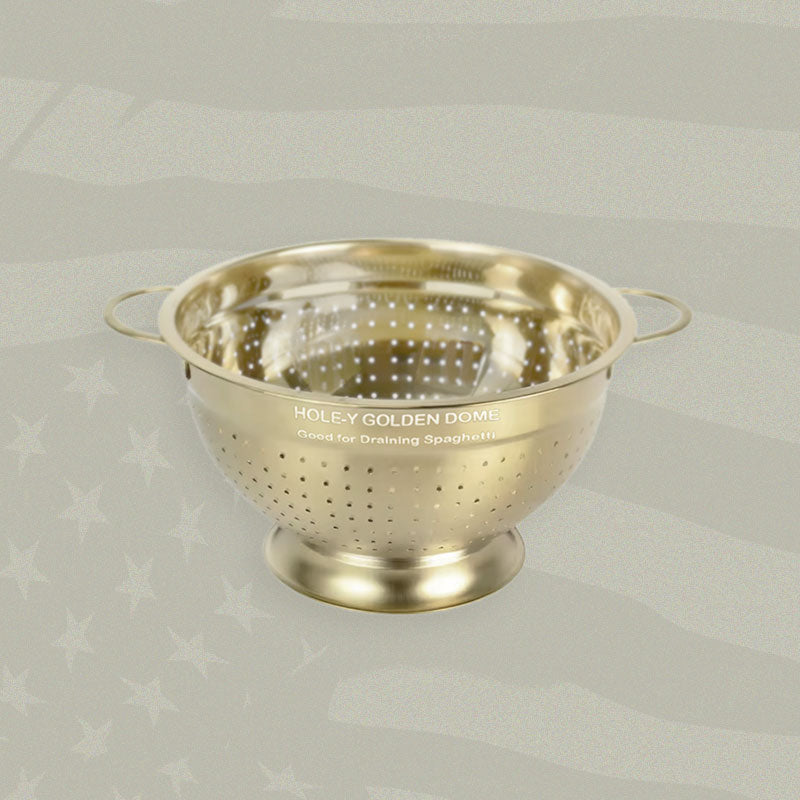 Gold-colored colander with 'Holey Golden Dome' branding on a light gray background